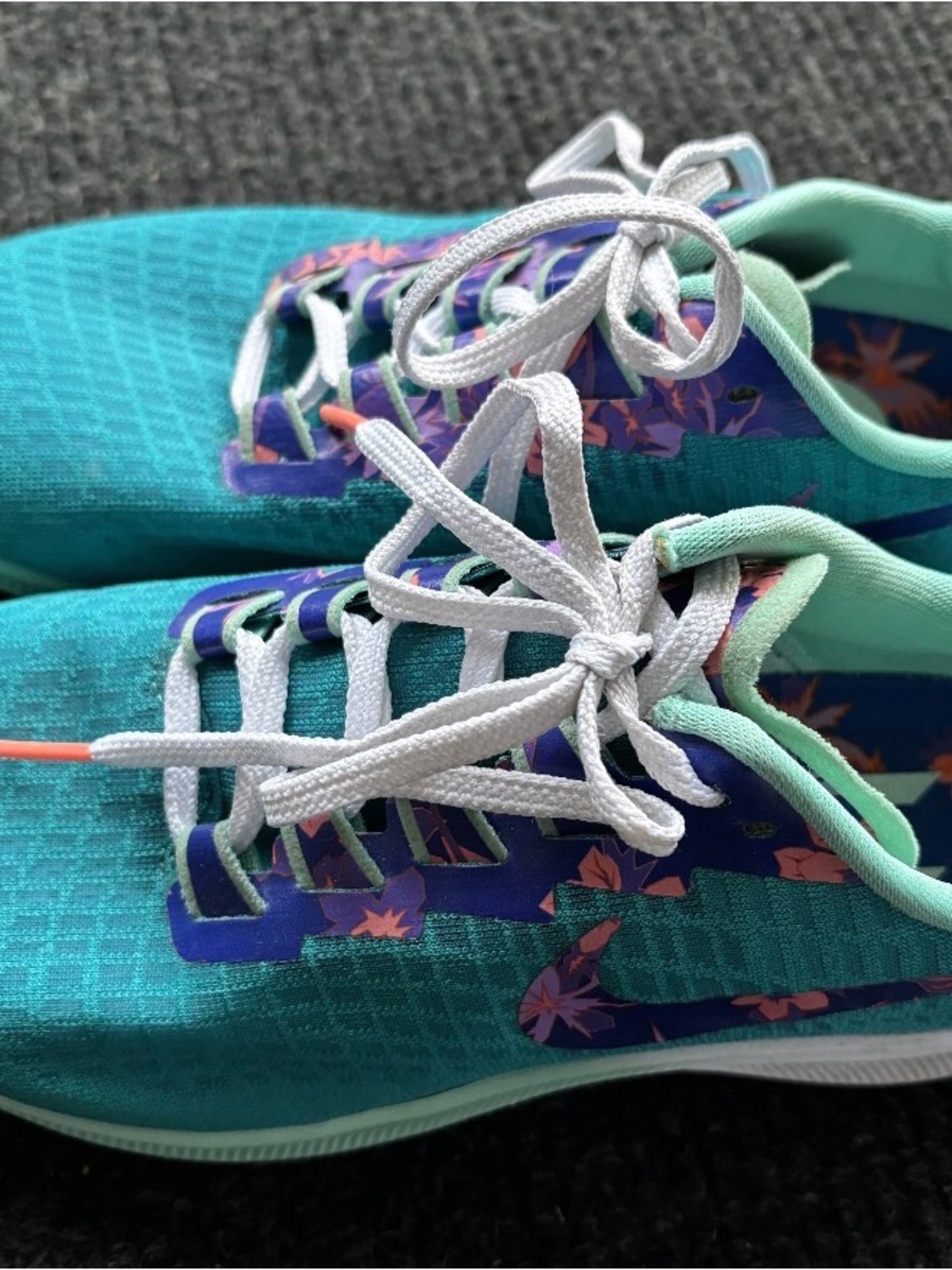 Nike Women’s Teal Athletic Shoes with Purple Floral Details